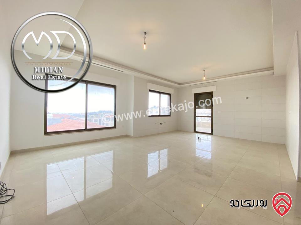 شقة جديدة للبيع في عمان - خلدا العوجانية طابق ثالث مع روف مساحة 225م تشطيبات و ديكورات سوبر ديلوكس اطلالة رائعة