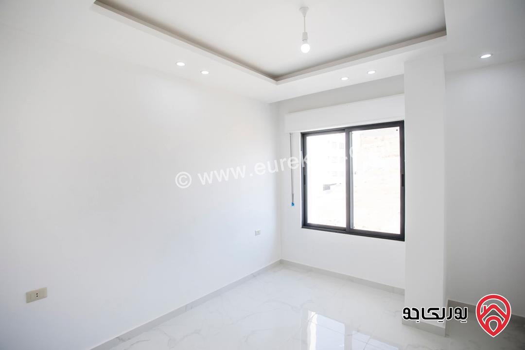 شقة فاخرة مساحة 110م طابق ثالث لم تسكن للبيع في عمان - ابو علندا الجديدة من المالك مباشرة