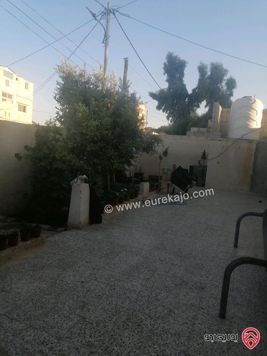 بيت مكون من شقتين على أرض 340م للبيع في المفرق الخالديه