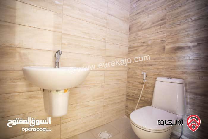 اخر شقة في المشروع طابق ثالث مع روف مبني مرخص مساحة 135م للبيع في عمان - ابو علندا 