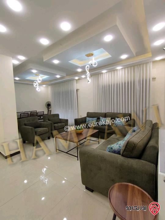 شقة مفروشة طابق ارضي مساحة 195م داخلي و 150م خارجي للايجار في عمان - طريق المطار 