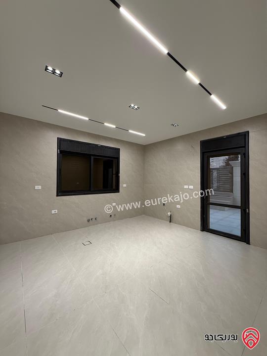 شقة طابق ارضي مساحة 227م مع ترس 60م سوبر ديلوكس للبيع في عمان - تلاع العلي