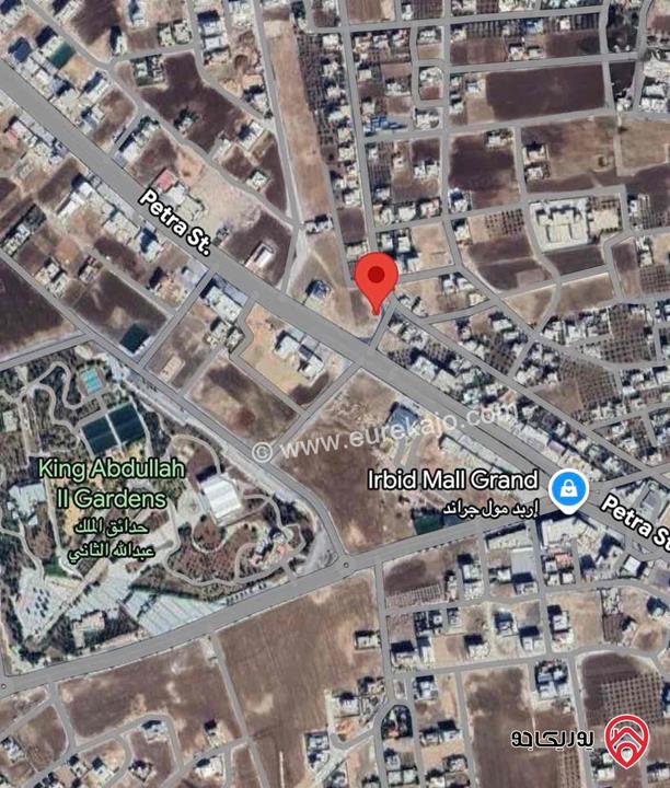 قطعة ارض مساحة 455 متر للبيع في اربد / حواره ، شارع البترا 