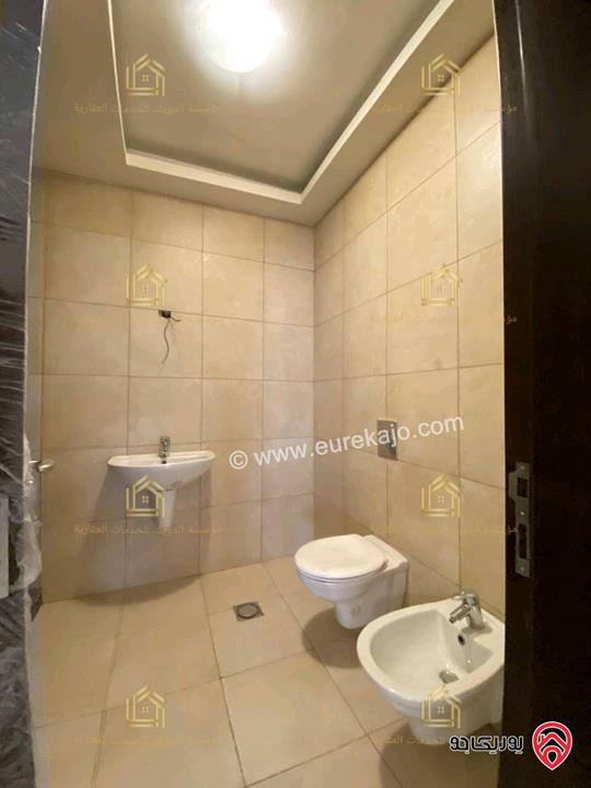 شقة جديدة لم تسكن طابق ارضي مساحة 200م مع ترس 40م للإيجار في عمان - خلدا 