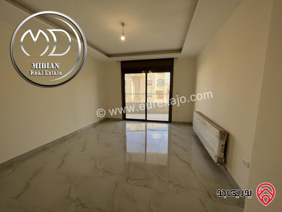 شقة أرضية جديدة للبيع في عمان - الدوار السابع مساحة 260م مع ترس و حديقة 200م تشطيبات سوبر ديلوكس بسعر مميز