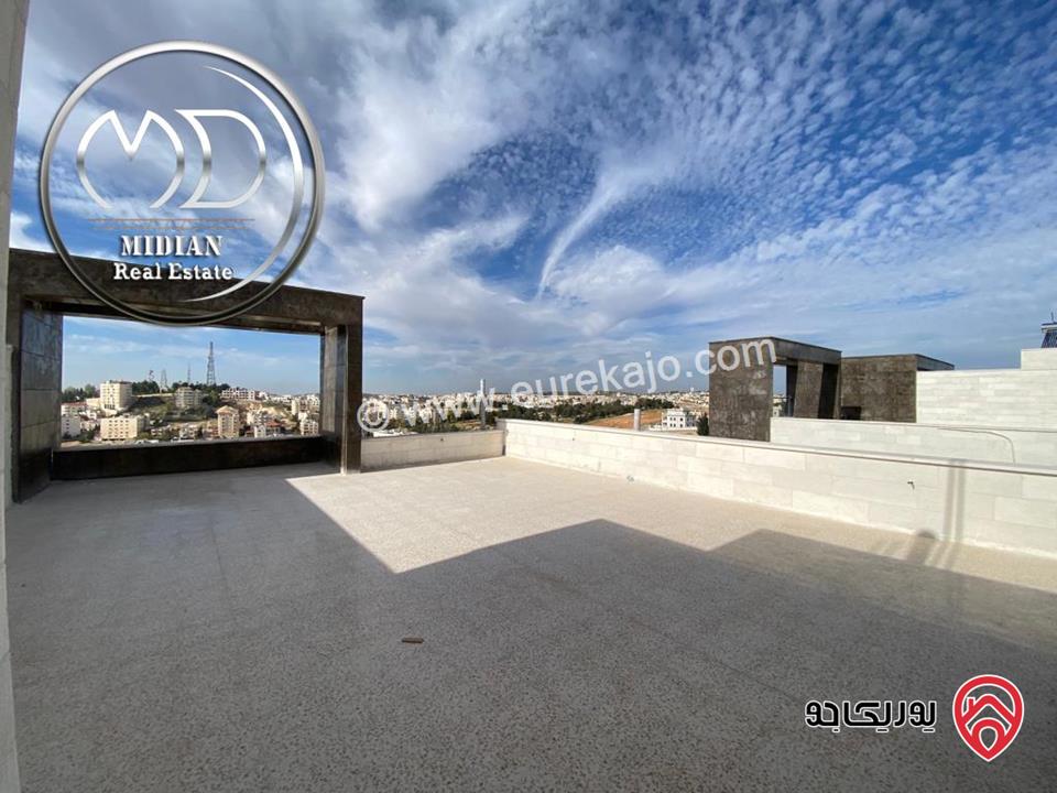 شقة دوبلكس جديدة طابق اخير مع روف للبيع في عمان - خلدا مساحة 285م مع تراسات تشطيبات و ديكورات فاخرة اطلالة جميلة