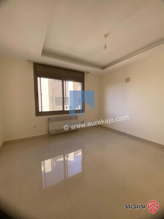 شقة فاخرة للبيع في عمان - أم أذينة قرب أبراج السادس طابق ثالث 180م مع روف دوبلكس 105م لم تسكن