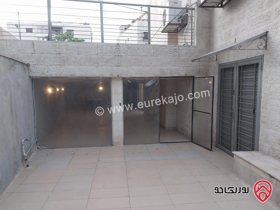 شقه للايجار في عمان - الدوار السابع مساحة 80م + 130م شبه ارضي قرب الترخيص