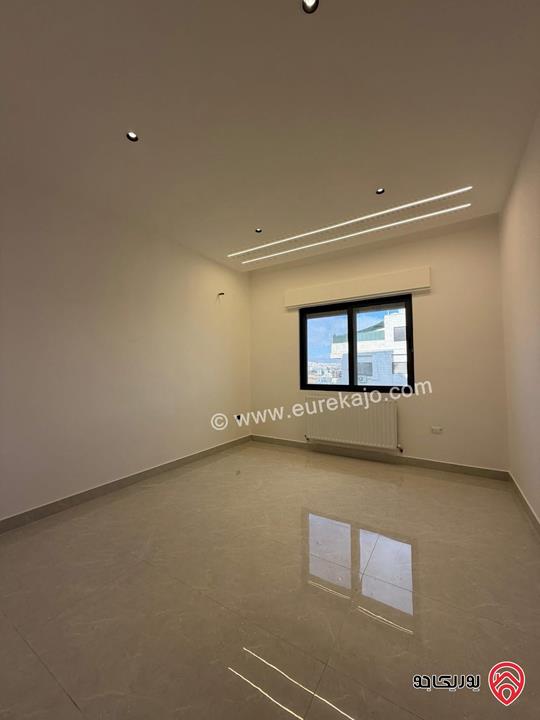 شقة طابق ارضي مساحة 130م مع ترس 50م للبيع في عمان - ربوة عبدون 