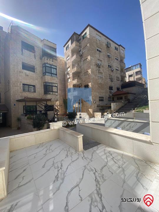 شقة أرضية فاخرة مساحة 200م مع ترس 10م لم تسكن للبيع في عمان - تلاع العلي