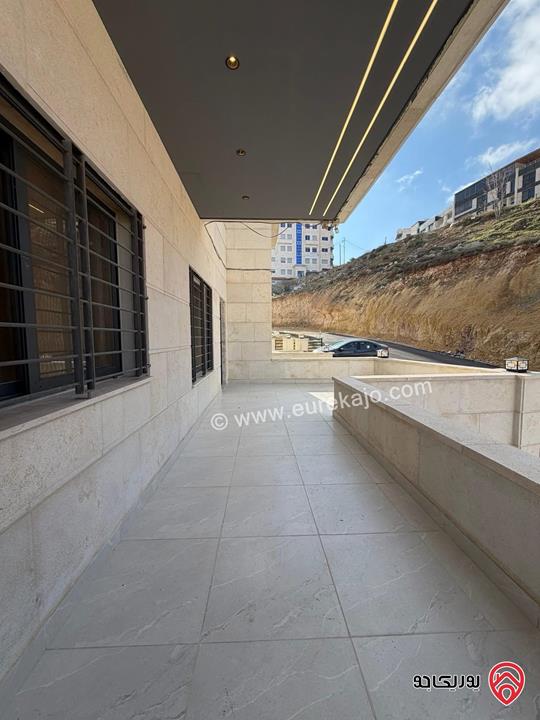 شقة طابق ارضي مساحة 130م مع ترس 50م للبيع في عمان - ربوة عبدون 