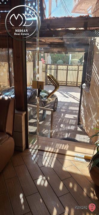 شقة ارضية دوبلكس للبيع في عمان - خلدا مساحة 260م مع ترس و حديقة 200م تشطيبات سوبر ديلوكس بسعر مميز جداً