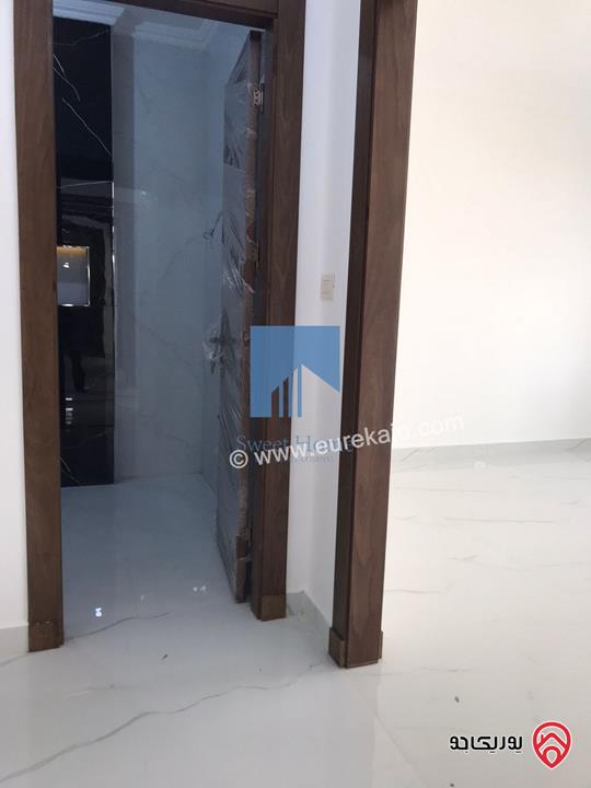 شقة فاخرة للبيع في عمان - خلدا قرب المدارس الإنجليزية 280م مع حديقة وترسات 320م لم تسكن