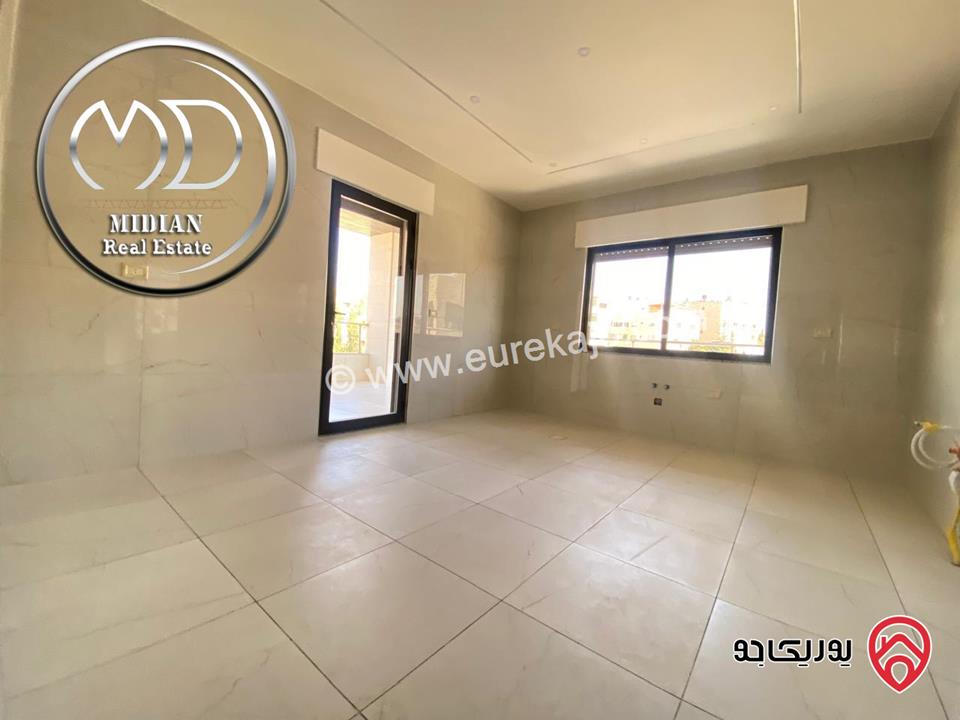 شقة دوبلكس جديدة طابق اخير مع روف للبيع في عمان - ضاحية الرشيد مساحة 250م مع تراسات تشطيبات سوبر ديلوكس اطلالة رائعة