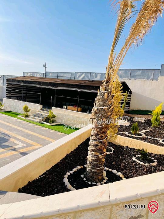 شاليه استثماري مميز مساحة الأرض 4 دونم و 500م والبناء 250م للبيع في المفرق - بلعما 