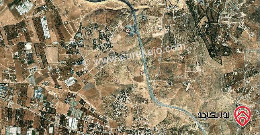 أرض مساحة 13 دونم و 657م للبيع من أراضي شمال عمان - موبص على شارع الأردن مباشرة