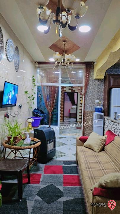 منزل طابقين مساحة الارض 860م ومساحة البناء 440م مرخص للبيع في عمان - خريبة السوق العلكومية 