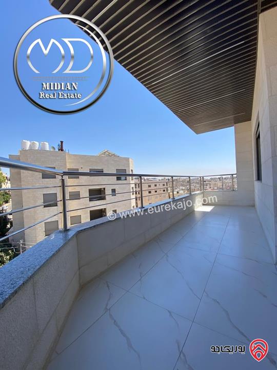 شقة دوبلكس جديدة طابق اخير مع روف للبيع في عمان - ضاحية الرشيد مساحة 250م مع تراسات تشطيبات سوبر ديلوكس اطلالة رائعة