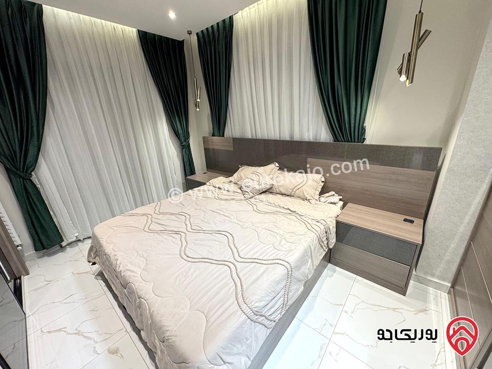 شقة شبه أرضية مساحة 135م داخلي مع حديقة 130م مفروشة بالكامل للايجار في عمان - عبدون