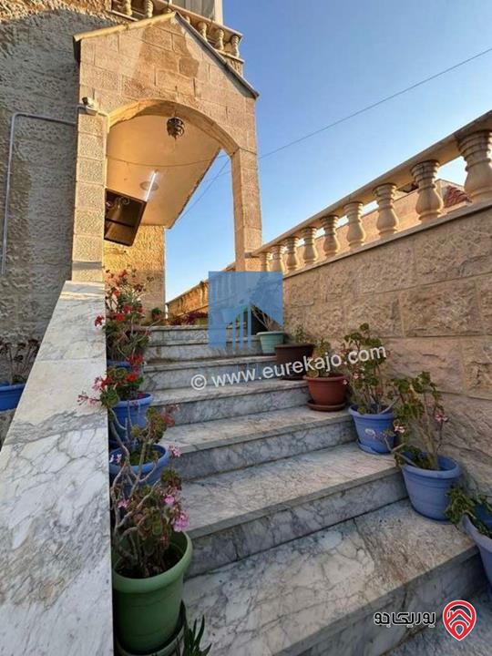 شقة أرضية مميزة للبيع في عمان - الجندويل 208م مع ترس 50م بسعر مغري