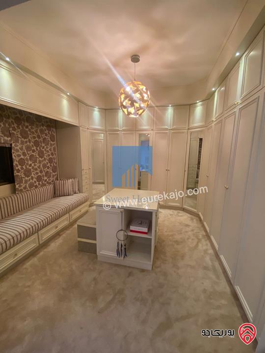 شقة شبه أرضية 200م مع ترسات 80م تشطيب سوبر ديلوكس للبيع في عمان - خلدا