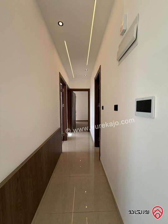 شقة سوبر ديلوكس شبه ارضي دوبلكس مساحة 228م مع ترس 40م للبيع في عمان - مرج الحمام 