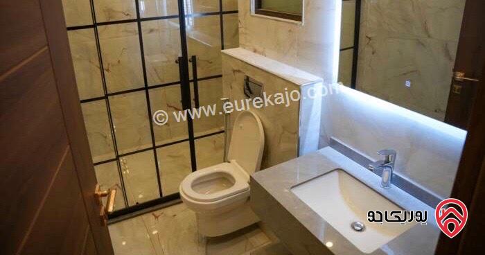 شقة شبه ارضي فاخرة مساحة 210م داخلي و 150م خارجي للايجار في عمان - طريق المطار 