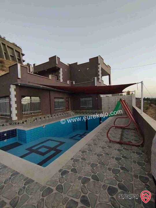 مزرعة مساحة الأرض 4 دونمات مع شاليه 250م للبيع في جرش خلف جامعة فيلادلفيا