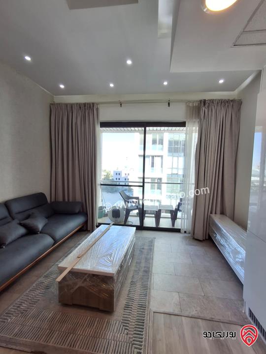 شقة مميزة طابق ثالث مساحة 54م للبيع في عمان - العبدلي برج داماك