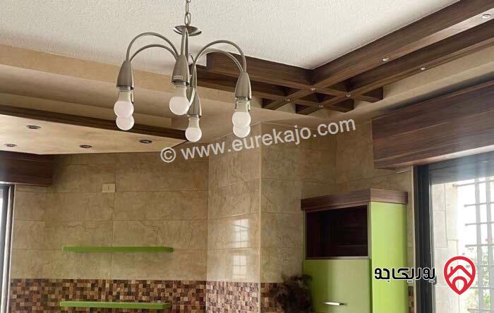 شقة مميزة مشمسة شبه ارضية مساحة 200م داخلي و 150م خارجي للايجار في عمان - خلدا 