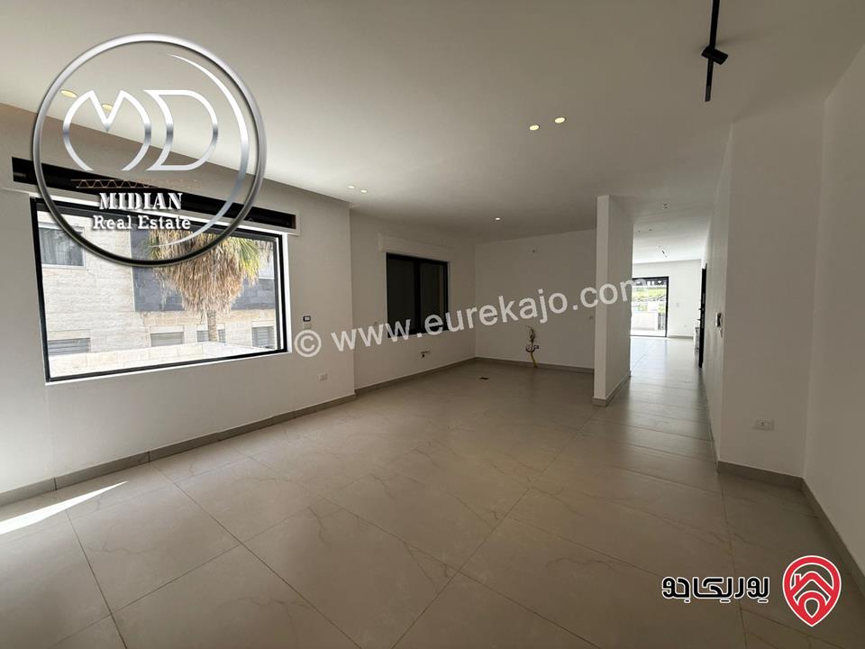 شقة ارضية للبيع في عمان - دير غبار مساحة 185م مع ترس 100م تشطيبات و ديكورات عصرية فاخرة جديدة لم تسكن