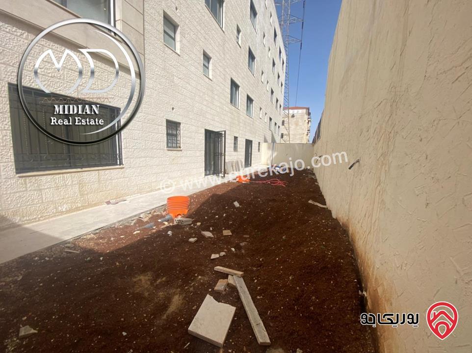 شقة ارضية جديدة للبيع في عمان - ضاحية النخيل مساحة 250م مع ترس و حديقة 150م تشطيبات و ديكورات سوبر ديلوكس