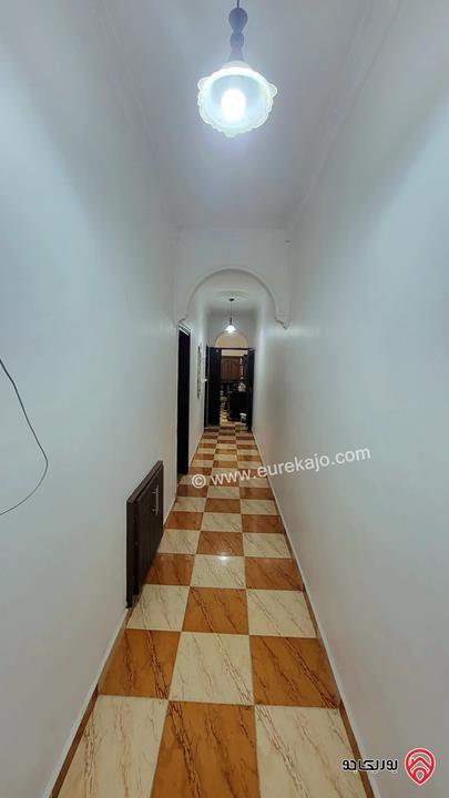 شقة أرضية مساحة 140م داخلي و 32م ترس للبيع في عمان - طبربور 