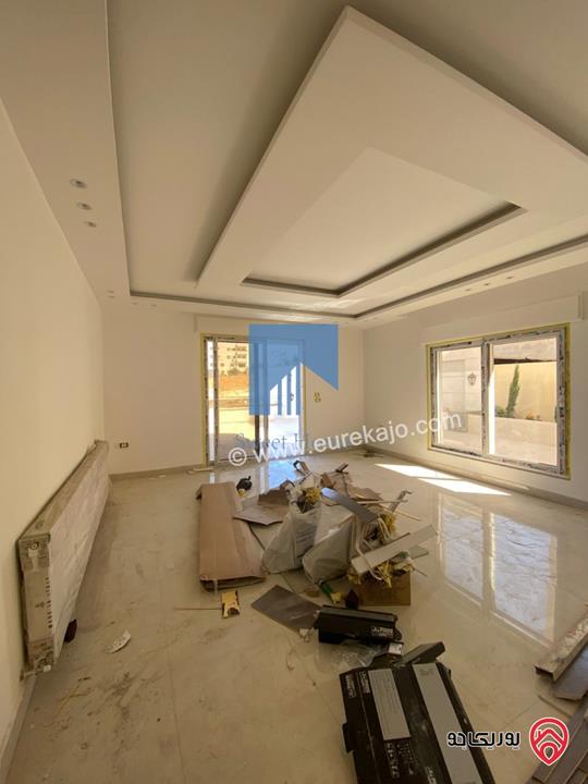 شقة أرضية فاخرة للبيع في عمان خلدا - قرب إشارة البنك العربي 175م مع ترسات 200م لم تسكن