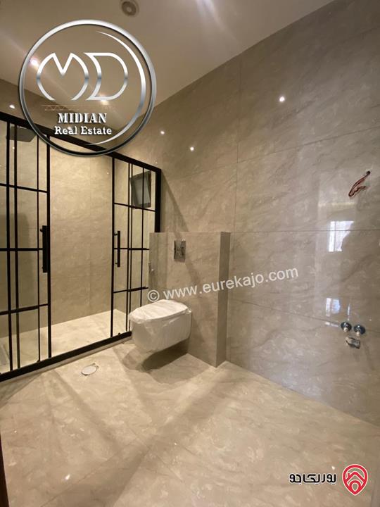 شقة ارضية جديدة للبيع في عمان - تلاع العلي مساحة 210م مع ترس و حديقة 140م تشطيبات ديكورات عصرية فاخرة بسعر مميز