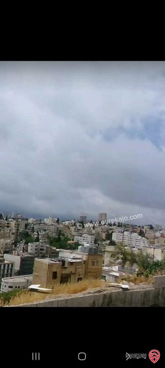 أرض تجارية مساحة 222م عليها بناء قديم للبيع في عمان - جبل الحسين  