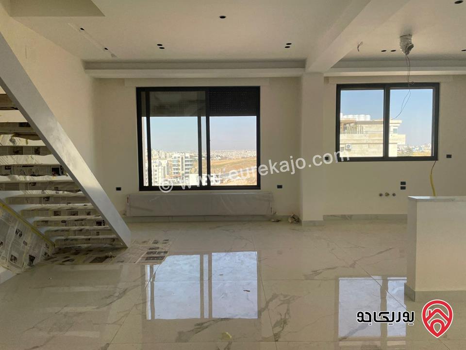 شقة للبيع في عمان - دير غبار طابق اخير مع روف مساحة البناء 180م ومساحة الترس 80م