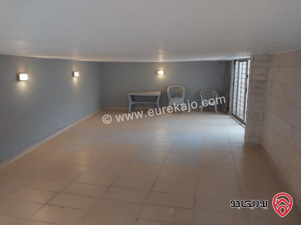 شقه للايجار في عمان - الدوار السابع مساحة 80م + 130م شبه ارضي قرب الترخيص