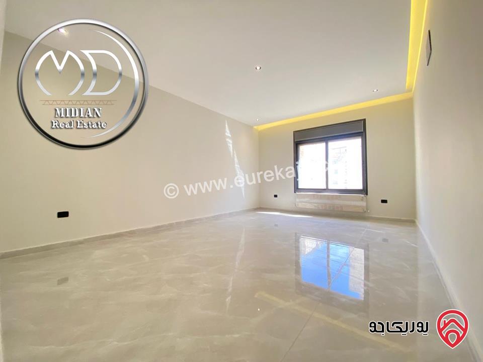 شقة ارضية جديدة للبيع في عمان - تلاع العلي مساحة 210م مع ترس و حديقة 140م تشطيبات ديكورات عصرية فاخرة بسعر مميز