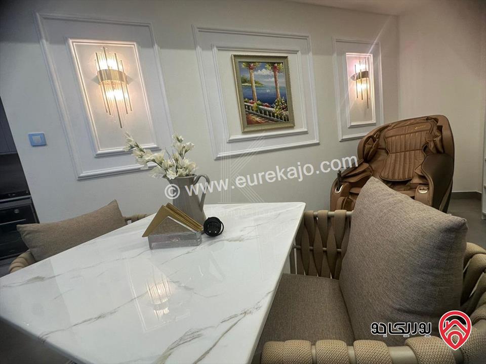 شقة مفروشة طابق ثاني مساحة 72م للبيع في عمان - العبدلي  برج داماك