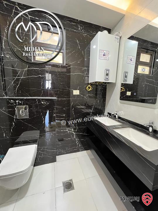 فيلا دوبلكس جديدة للبيع في عمان - خلدا مساحة 450م مع تراسات و حدائق 250م تشطيبات و ديكورات فاخرة بسعر مميز