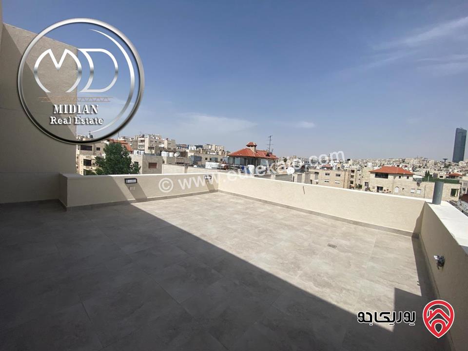 شقة دوبلكس جديدة طابق اخير مع روف للبيع في عمان - الجندويل مساحة 230م مع تراسات تشطيبات ديكورات عصرية اطلالة جميلة