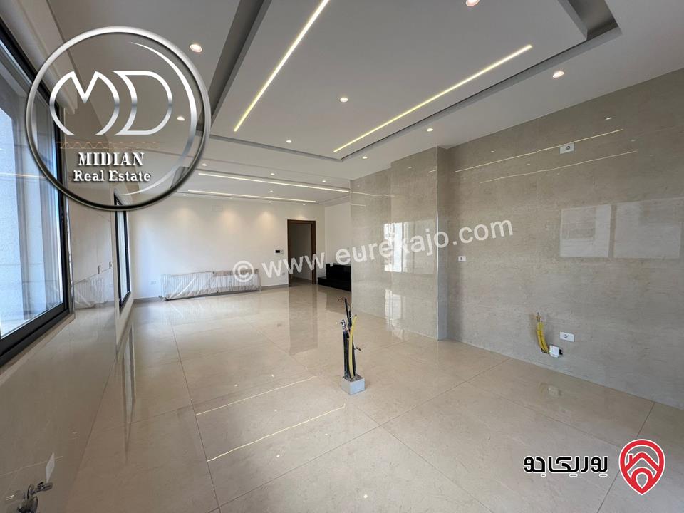 شقق فاخرة للبيع في عمان - ضاحية النخيل مساحات 225م تشطيبات وديكورات عصرية اطلالة جميلة جديدة لم تسكن