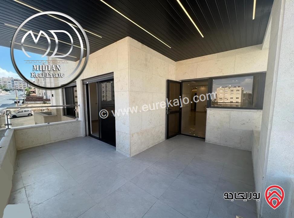 شقة دوبلكس جديدة للبيع طابق اخير مع روف في عمان - ضاحية الرشيد مساحة 215م مع تراسات اطلالة رائعة بسعر مميز جداً