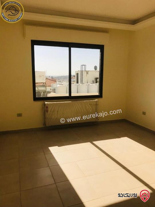 شقة فاخرة للبيع في عمان - خلدا - العوجانية قرب الهمشري طابق ثالث 200م مع روف دوبلكس 140م لم تسكن