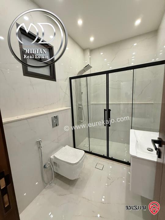 شقق شبه أرضي للبيع في عمان - حي الصحابة مساحات 220م & 240م مع تراسات و حدائق تشطيبات ديكورات فاخرة جديدة لم تسكن