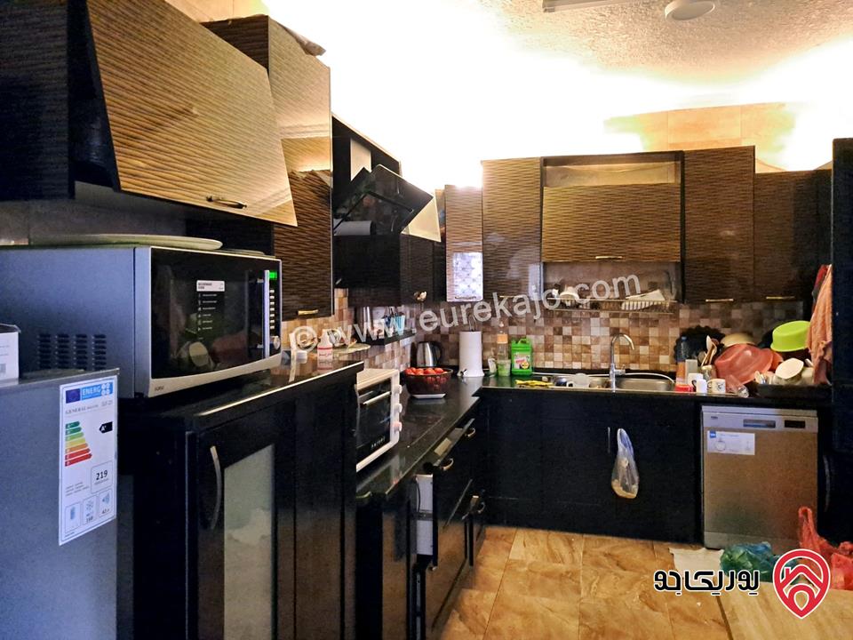 شقة طابق شبه ارضي مساحة 143م داخلي و 50م خارجي للبيع في عمان - أم نوارة