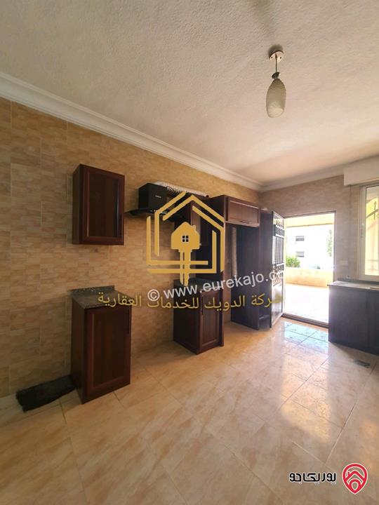 شقة فارغة طابق ارضي مساحة 150م داخلي مع 50م ترس للإيجار في عمان - ضاحية الأقصى 