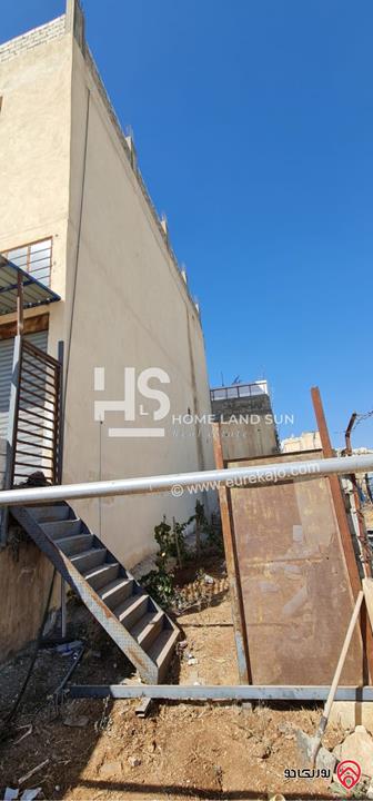 مجمع تجاري على أرض 1552م للبيع في عمان - ابو علندا ب دخل سنوي 26000 دينار