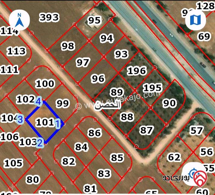 قطعة ارض مساحة 891م للبيع في اربد من اراضي الحصن على طريق اربد عمان 